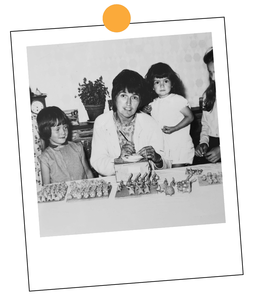 Miranda with her children at a table